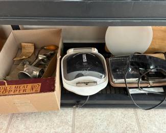 Vintage meat grinder (left) and appliances (right)
