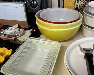 Vintage yellow  and red Pyrex bowls and casserole with lid