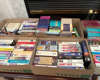 Large selection of VHS, DVDs, CDs, and books