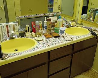 Fun yellow bathroom with lots of vintage treasures!
