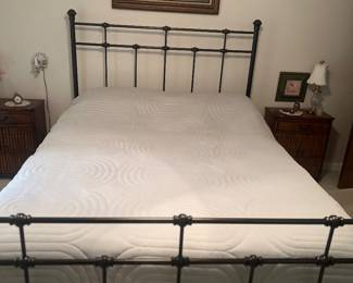 Iron Bed and Framed Art