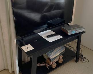 This television, clock radio, stand, and lighted covered wagon model (more on that later) are available.