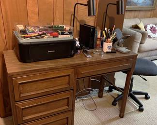 Going the other way around the tall bookcase we find this small desk (Linear by Morris of California), lamps, and printer.