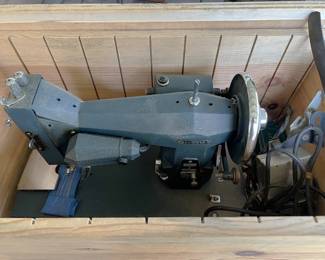 This does appear to be a vintage industrial Kenmore sewing machine.