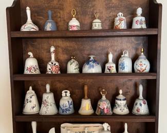 This is a nice collection of decorative handbells, and a nice shelf unit, too.