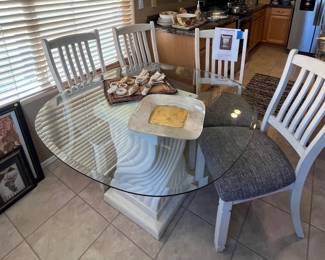 This beautiful pedestal glass table is also for sale with four chairs