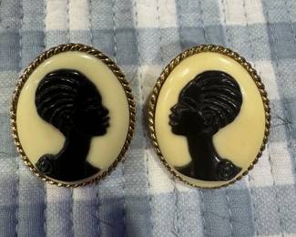 2 pairs of coreen Simpson cameo earrings. One pair is clip on 
