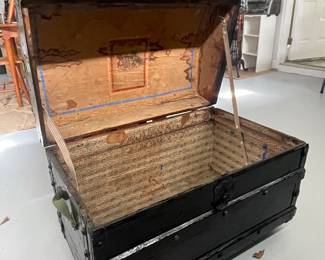 Large wood trunk  on rollers with vintage graphics