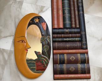 1970s moon and frog mirror and faux books plaque
