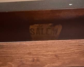 Tag on antique bed