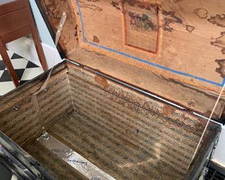 Large wood trunk with vintage graphics on lid