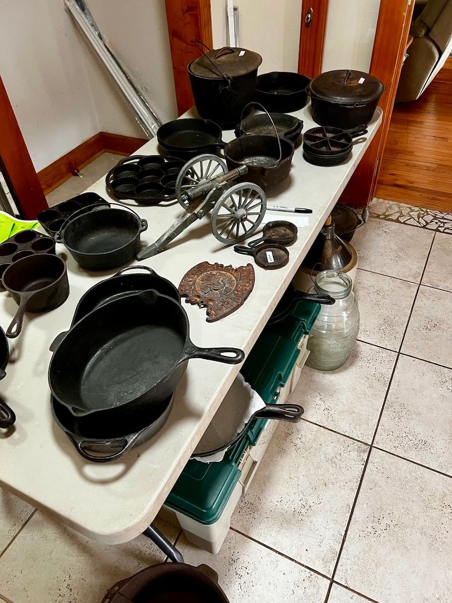 Vintage and antique cast iron pans, pots, trivets, dutch ovens
