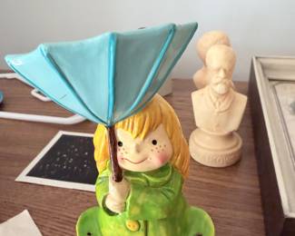 Girl with Umbrella Bank