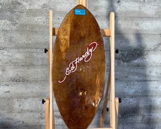 Ed Hardy skimboard featuring bold tiger-themed artwork and vibrant illustrations in signature style. Measures 40” H x 17.5” W and includes ’50-150 Weight Class’ labeling.