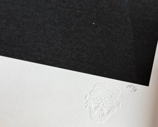 This lot features a signed limited edition print of Paul Walker by renowned photographer, Patrick Hoelck. Measures, 36” H x 30” W.