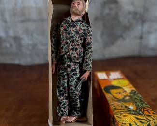 Hasbro G.I. Joe Land Adventurer action figure with original box and accessories.