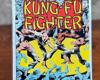 Richard Dragon: Kung-Fu Fighter Issue #1, published by DC Comics in May 1975. Debut issue featuring vibrant cover art and the introduction of Richard Dragon to the DC Universe. Preserved in a protective sleeve. 25-cent cover price indicated.