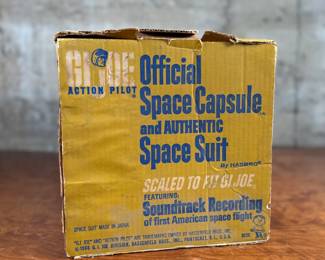 G.I. Joe Official Space Capsule and Authentic Space Suit by Hasbro, designed to fit the G.I. Joe action figure series. Includes original packaging, showing light wear commensurate with age. Features astronaut equipment, the space capsule, and a soundtrack recording of the first American space flight. G.I. Joe figure not included.