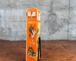 Hasbro G.I. Joe Land Adventurer action figure with original box and accessories.