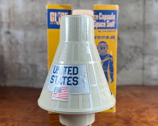 G.I. Joe Official Space Capsule and Authentic Space Suit by Hasbro, designed to fit the G.I. Joe action figure series. Includes original packaging, showing light wear commensurate with age. Features astronaut equipment, the space capsule, and a soundtrack recording of the first American space flight. G.I. Joe figure not included.