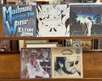 This lot features five (5) Elton John vinyl records.