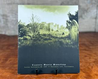 Classic Movie Monsters stamp collection commemorating iconic Hollywood characters. Includes a presentation folder with informational text and two sheets of stamps depicting monsters such as Dracula, Frankenstein, and more. Stamped with an issue date of September 30, 1997, at Universal City, California.