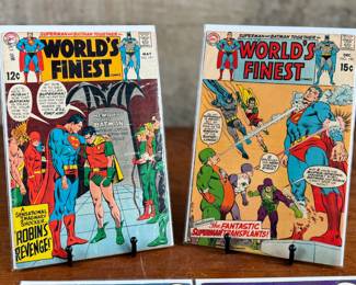 This lot features four World’s Finest comic books featuring Superman and Batman stories. Comics display artwork and storylines typical of DC publications. Titles include issues with cover prices of 12¢, 15¢, 20¢, and 25¢. Each comic is bagged and backed.