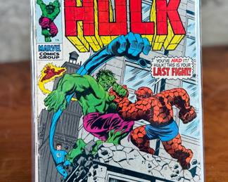 Marvel Comics The Incredible Hulk #122, published in December 1969, features the iconic battle between the Hulk and the Thing with a guest appearance by the Fantastic Four. The cover price is listed at 15 cents. Stored in a protective comic sleeve with a backing board.
