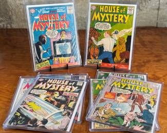 This lot features eight (8) DC Comics’ ‘House of Mystery’ comic books featuring various issues from the early series run including two copies of #57, #56, #58, #63, #64, #65, and #66. Notable covers include ‘The Ageless Man, ’ ‘The Secret Carved in Wood, ’ and ‘The Crown of Doom.’ All books are bagged and boarded for protection.