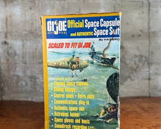 G.I. Joe Official Space Capsule and Authentic Space Suit by Hasbro, designed to fit the G.I. Joe action figure series. Includes original packaging, showing light wear commensurate with age. Features astronaut equipment, the space capsule, and a soundtrack recording of the first American space flight. G.I. Joe figure not included.