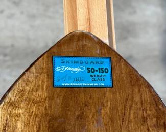 Ed Hardy skimboard featuring bold tiger-themed artwork and vibrant illustrations in signature style. Measures 40” H x 17.5” W and includes ’50-150 Weight Class’ labeling.