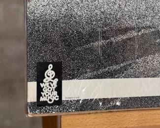 Promotional poster for Bad Company’s album ‘Burnin’ Sky, ’ featuring a black-and-white design with the band’s image and album title. The poster measures 16.5” H x 23” W.