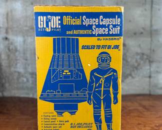 G.I. Joe Official Space Capsule and Authentic Space Suit by Hasbro, designed to fit the G.I. Joe action figure series. Includes original packaging, showing light wear commensurate with age. Features astronaut equipment, the space capsule, and a soundtrack recording of the first American space flight. G.I. Joe figure not included.