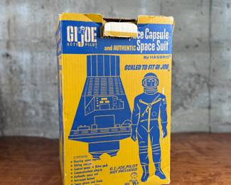 G.I. Joe Official Space Capsule and Authentic Space Suit by Hasbro, designed to fit the G.I. Joe action figure series. Includes original packaging, showing light wear commensurate with age. Features astronaut equipment, the space capsule, and a soundtrack recording of the first American space flight. G.I. Joe figure not included.