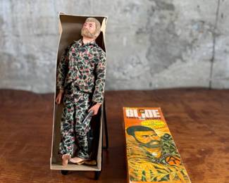 Hasbro G.I. Joe Land Adventurer action figure with original box and accessories.