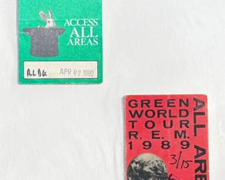 This lot features two (2) vintage All Access passes. The Rush pass features a green design with a rabbit emerging from a hat and is marked ‘APR 6, 1991.’ The R.E.M. pass is a red design from the ‘Green World Tour 1989,’ numbered ‘3/15.’ Both are collectible memorabilia from popular rock bands’ tours.