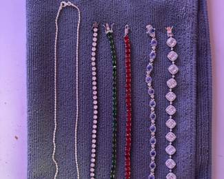 5 Sterling braclets, one sterling necklace , and three vintage broaches 