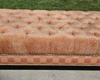 Deep-tufted button upholstered ottoman.
