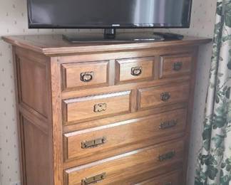 Solid wood dresser - classic design with three main drawers, five smaller drawers in top two tiers.
