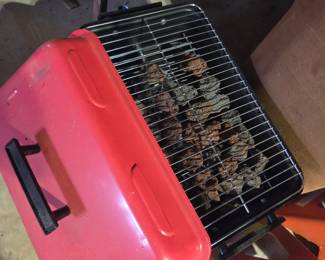 #140	Orange Portable Propane Grill	 $20.00 