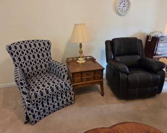 #15	Navy/White Swivel Rocker/Recliner 	 $75.00 #17	Dark Brown Pleather Recliner w/manual lift and continuous seat	 $175.00 