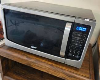 #55	Oster Table-Top Microwave	 $20.00 