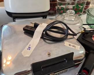 #49	Black Angus Waffle Maker	 $25.00 