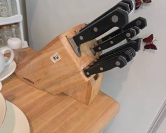 #61	Mixed Set of Hoffritz Knives and Faberware Serving knives in Wood Block	 $45.00 