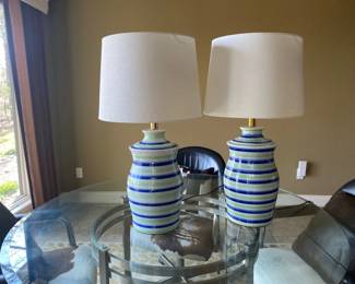Pair of mid century lamps that have been rewired. Small chip on one.
