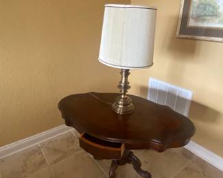 Unique antique table with two drawers.