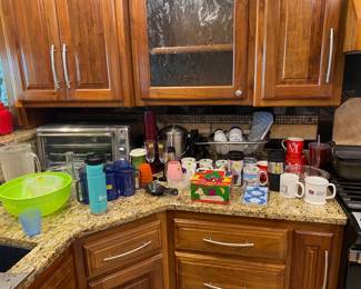 Miscellaneous kitchen items including toaster oven/air fryer.