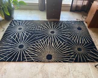 There are THREE rugs available in this pattern.  Three different sizes.