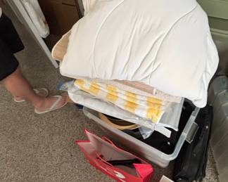 White Down Comforter with Yellow Striped Blanket and Storage Bin