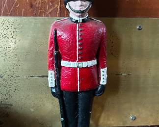 Cast Iron Door Stopper Depicting British Guard